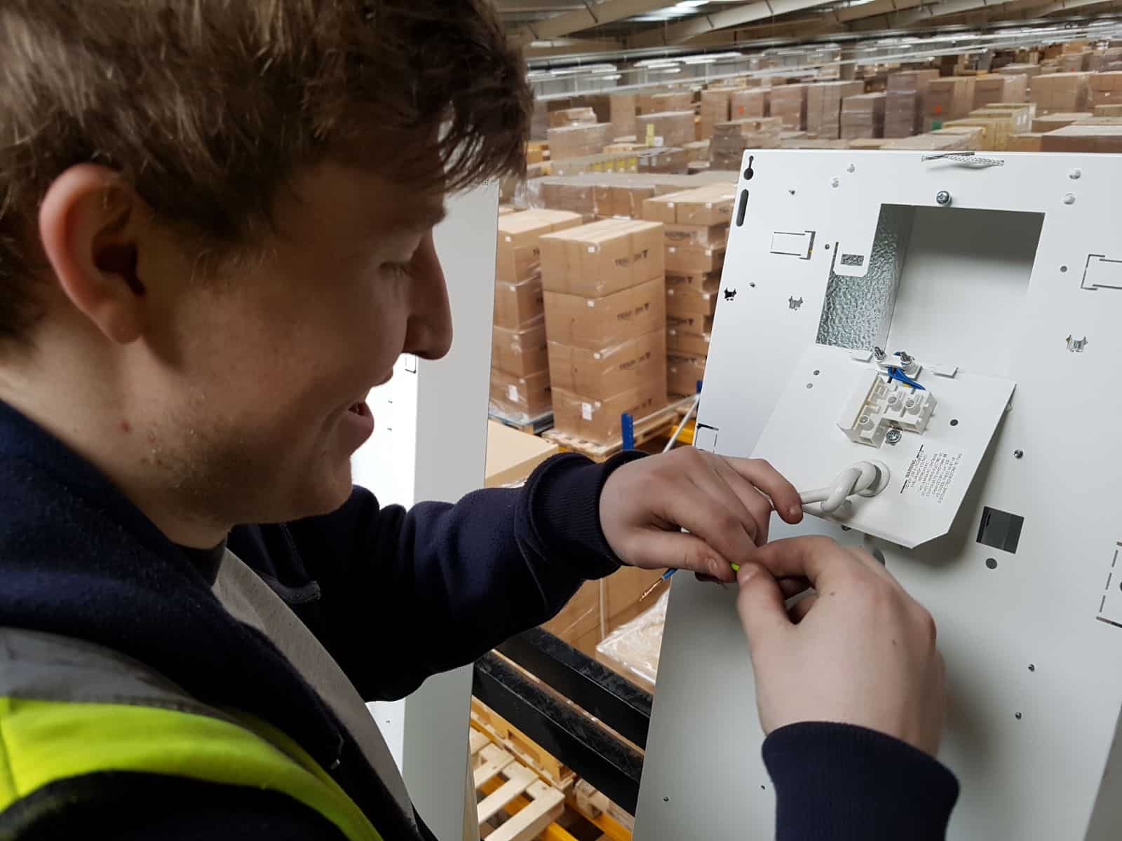 man near electrical panel